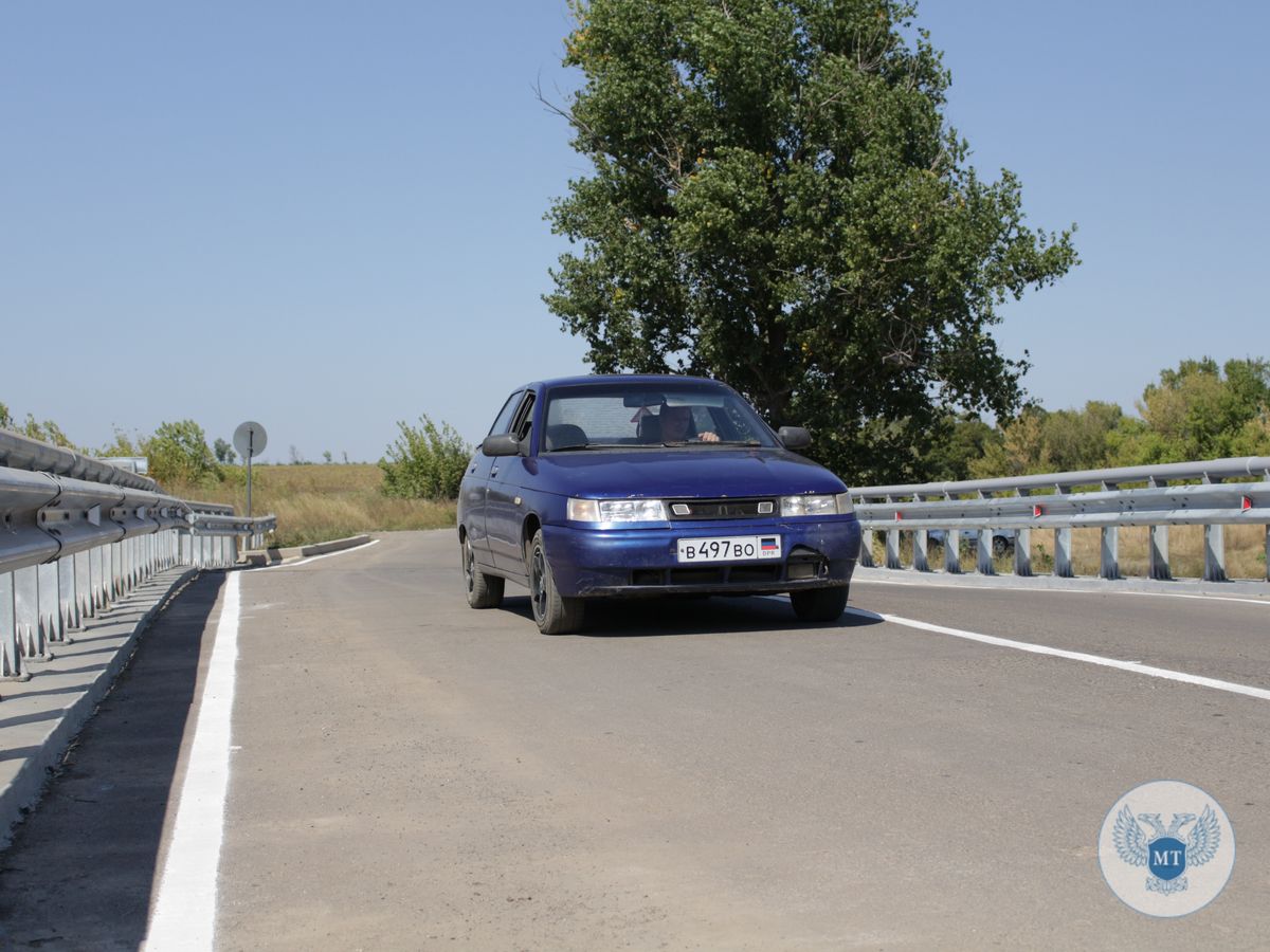 Завершены работы по восстановлению моста в Амвросиевском районе